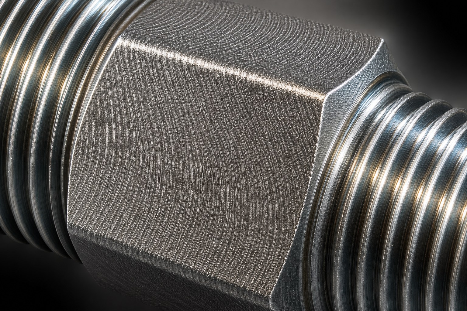 Close-up of the machined hex flats and threads of the Hexa 1 inch MNPT Hex Nipple