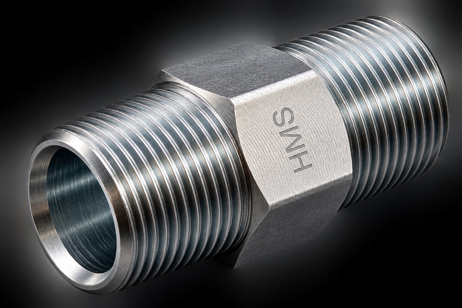Studio photograph of the Hexa 1 inch MNPT Hex Nipple showing the threaded ends and the HMS stamped hex flats